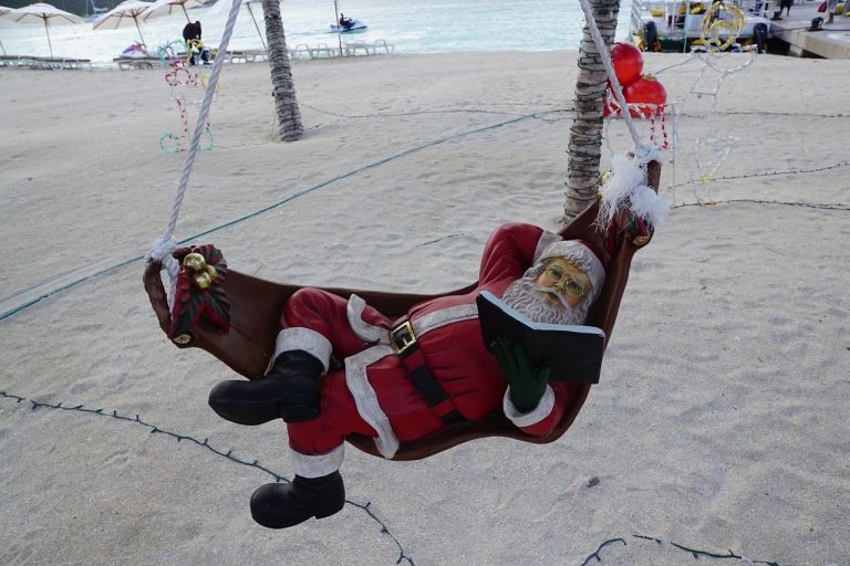 perché andare a punta cana a Natale, babbo Natale sulla spiaggia, punto di rotta